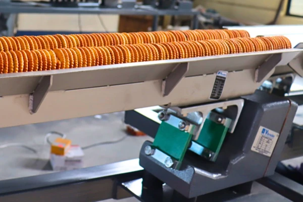 Vibrating biscuit conveying system conveyor manufacturer shrivibracion